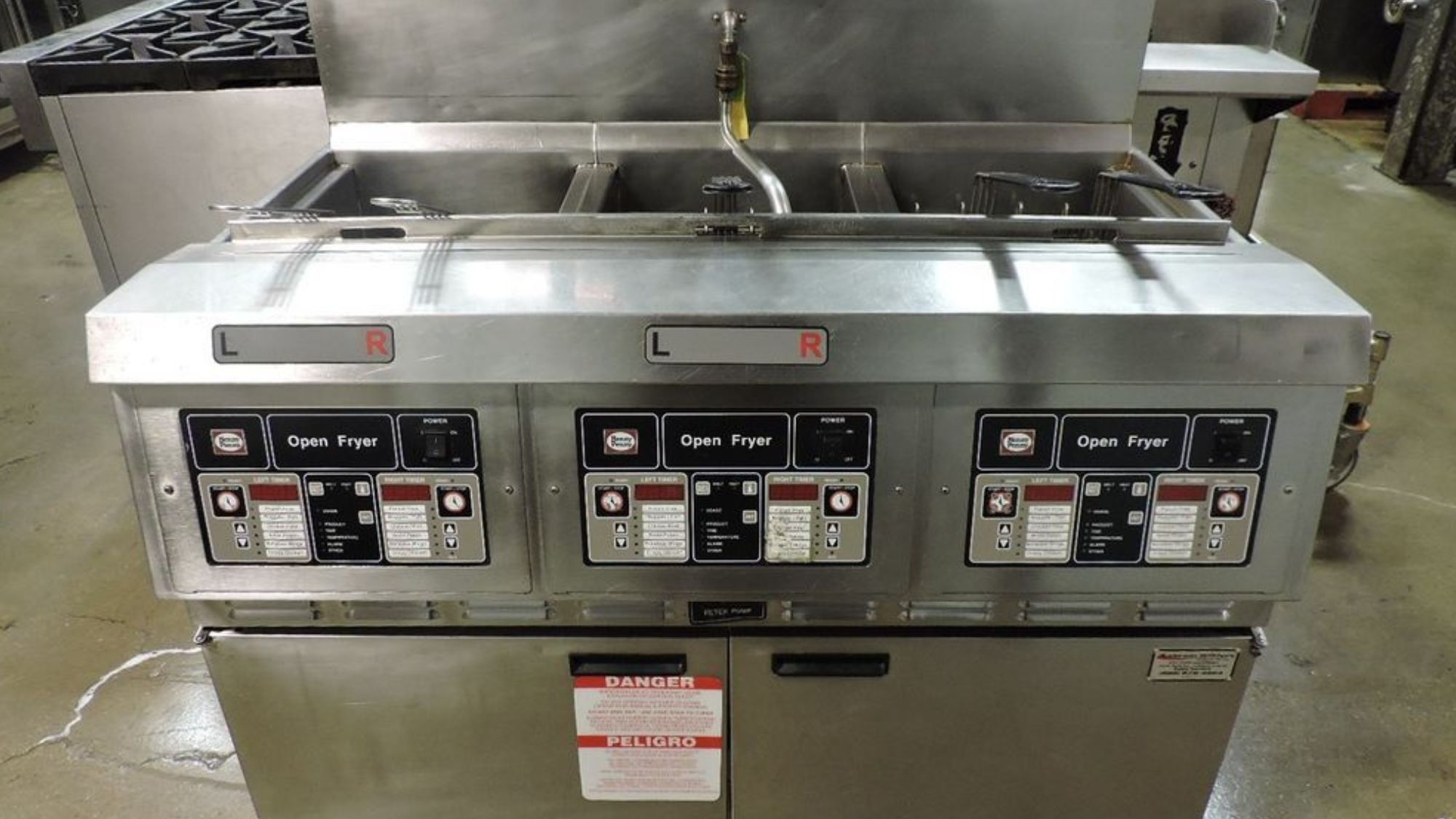 A Henny Penny equipment commercial fryer with two burners and a timer